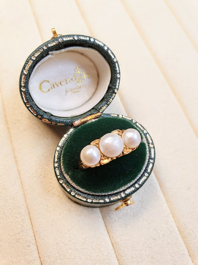 three stone pearl ring in green cavendish jewellers ring box
