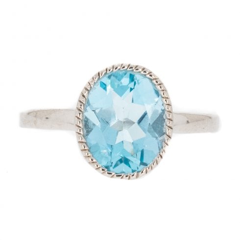 Silver And Faceted Blue Topaz Single Stone Dress Ring