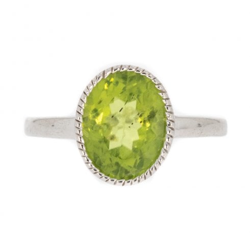 Silver And Faceted Peridot Single Stone Dress Ring